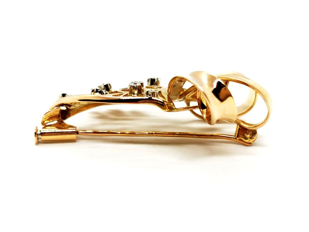 Broche en or jaune et diamants - Castafiore