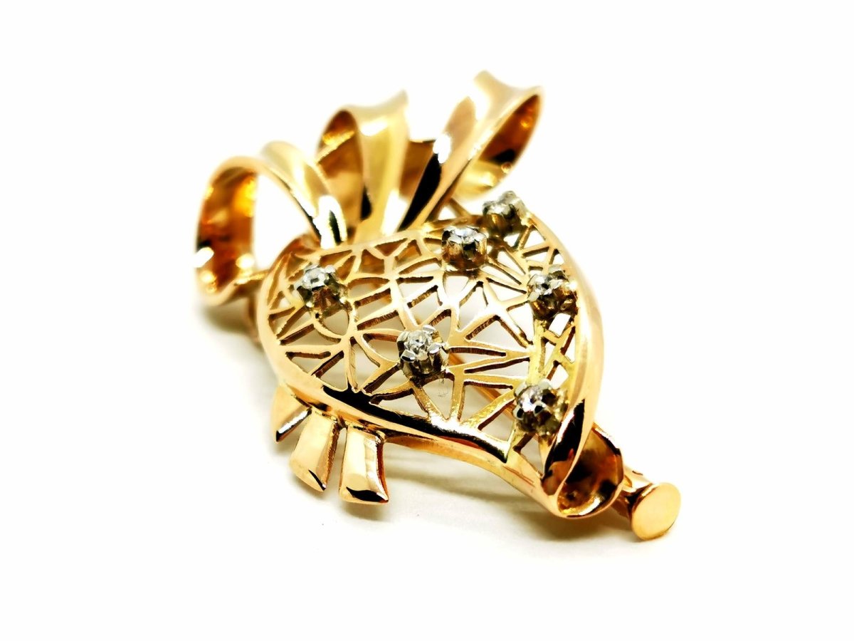 Broche en or jaune et diamants - Castafiore
