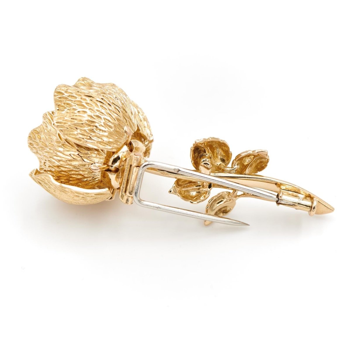 Broche fleur articulée en or jaune et saphirs - Castafiore