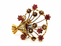 Broche fleur en 2 ors, diamants et rubis - Castafiore