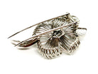 Broche fleur en or blanc et diamants - Castafiore