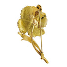 Broche fleur or jaune et diamants - Castafiore