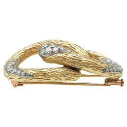 Broche MAUBOUSSIN "Boucle" en or jaune et platine, diamants - Castafiore