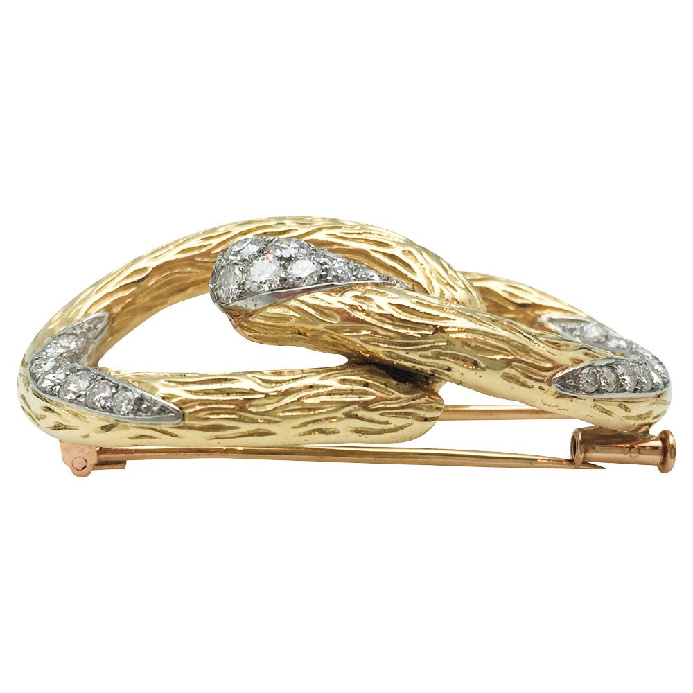 Broche MAUBOUSSIN "Boucle" en or jaune et platine, diamants - Castafiore