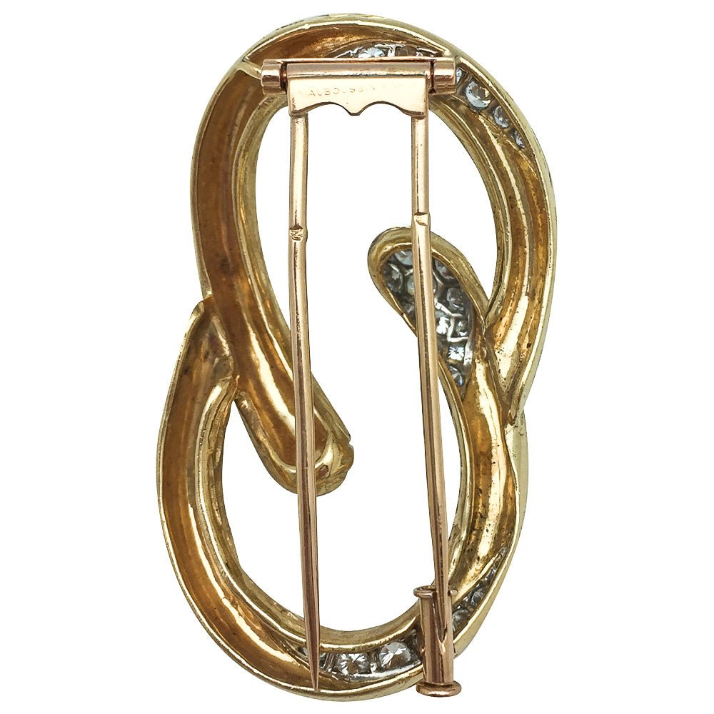 Broche MAUBOUSSIN "Boucle" en or jaune et platine, diamants - Castafiore