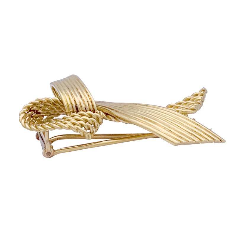 Broche Mauboussin vintage "Ruban", or jaune. - Castafiore