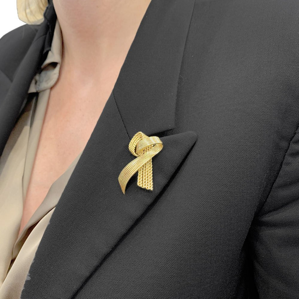 Broche Mauboussin vintage "Ruban", or jaune. - Castafiore