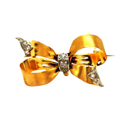 Broche nœud en 2 ors et diamants - Castafiore