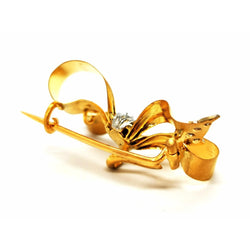 Broche nœud en 2 ors et diamants - Castafiore