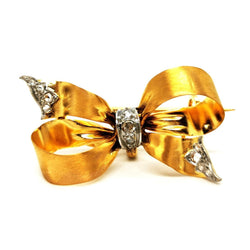 Broche nœud en 2 ors et diamants - Castafiore