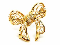 Broche noeud en or jaune, diamants et perles - Castafiore