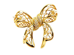 Broche noeud en or jaune, diamants et perles - Castafiore