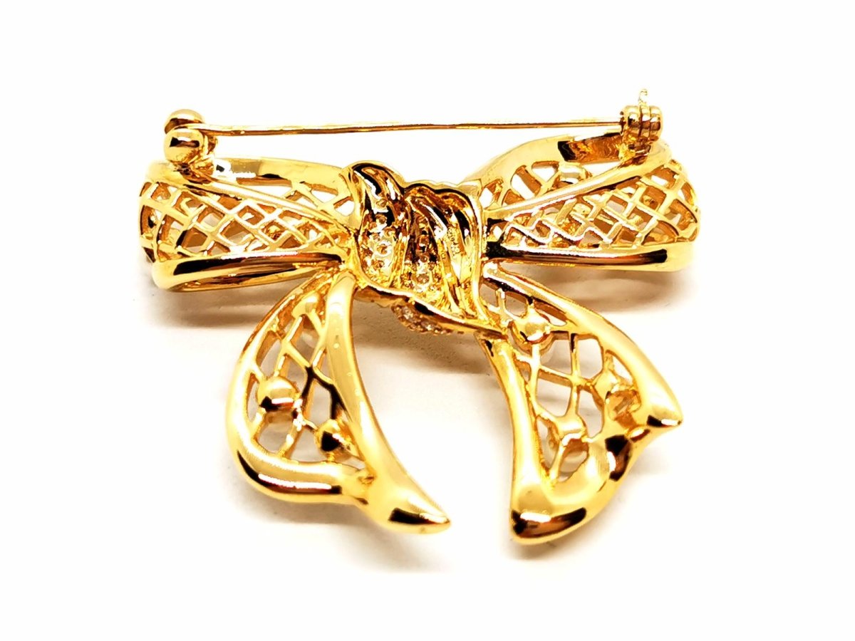 Broche noeud en or jaune, diamants et perles - Castafiore