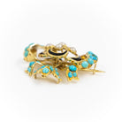 Broche nœud en or jaune, turquoise et perles - Castafiore