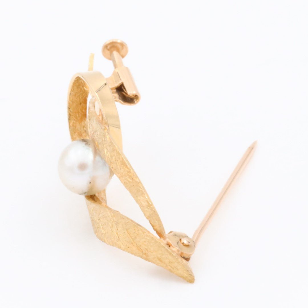 Broche or jaune et perle - Castafiore