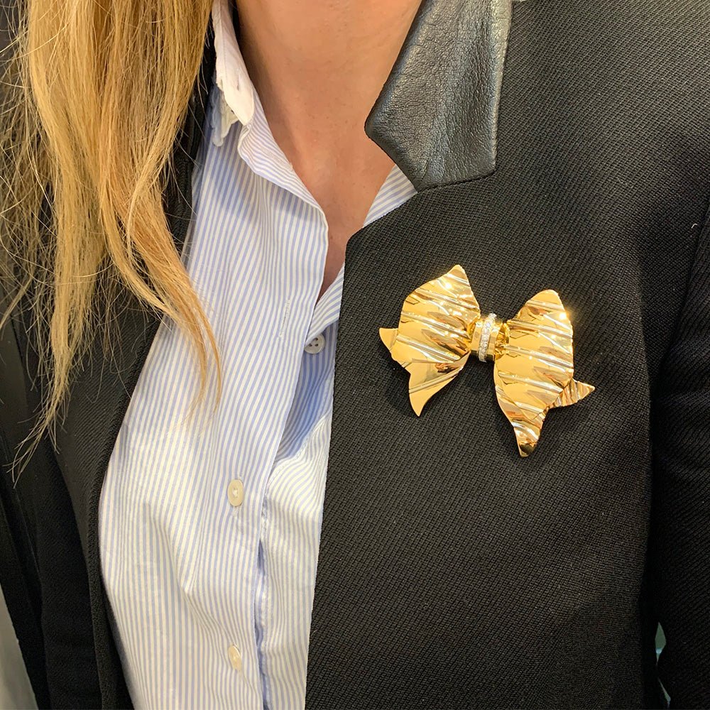 Broche REPOSSI "noeud" en ors jaune et blanc, diamants - Castafiore