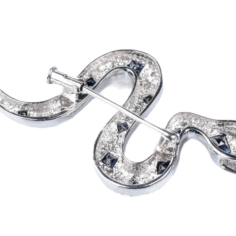 Broche serpent saphir diamant en or blanc 18 carats - Castafiore
