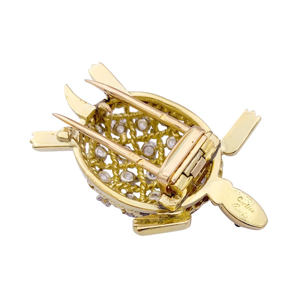 BrocheCARTIER "Tortue", or jaune et diamants. - Castafiore