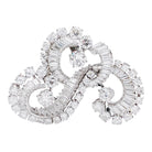 Clip J.Lacloche, "Volutes", platine, or blanc, diamants - Castafiore