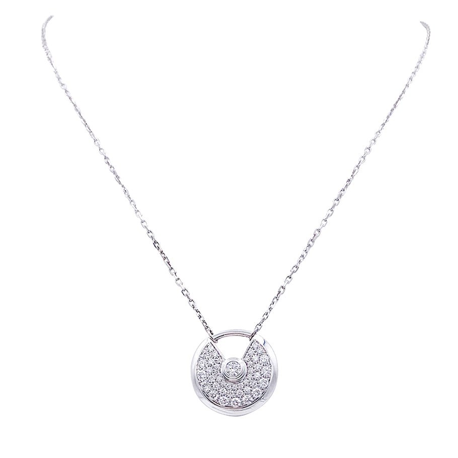 Collier Cartier, "Amulette", or blanc, diamants. - Castafiore