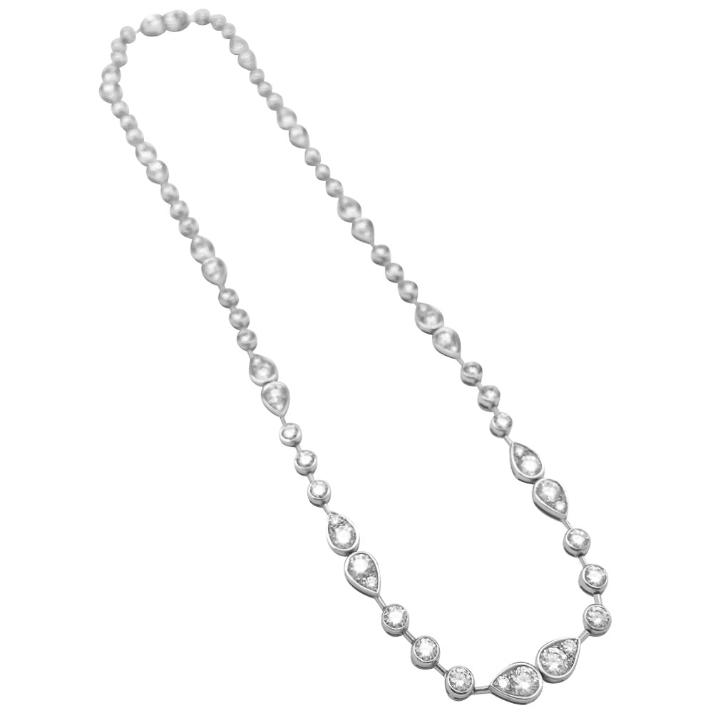 Collier CARTIER "Dentelle" en platine, diamants - Castafiore