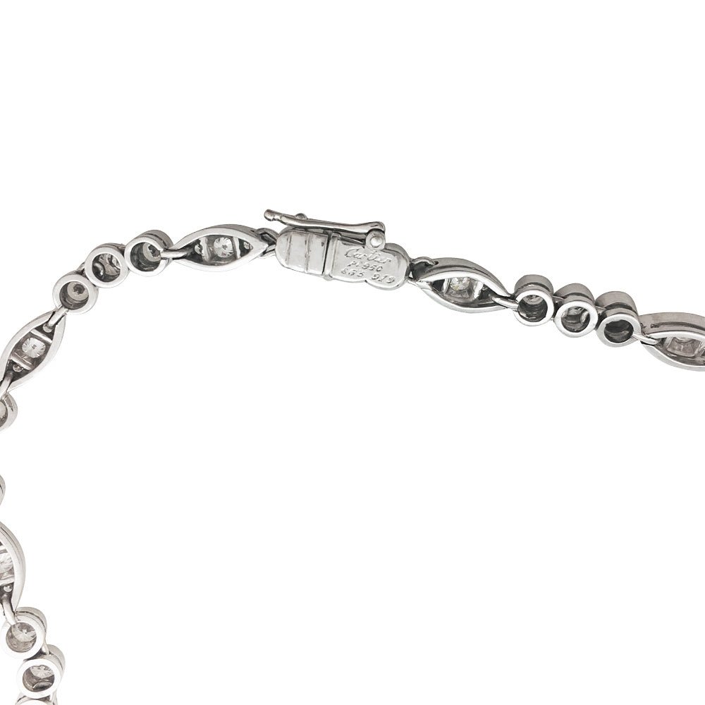 Collier CARTIER "Dentelle" en platine, or blanc et diamants - Castafiore