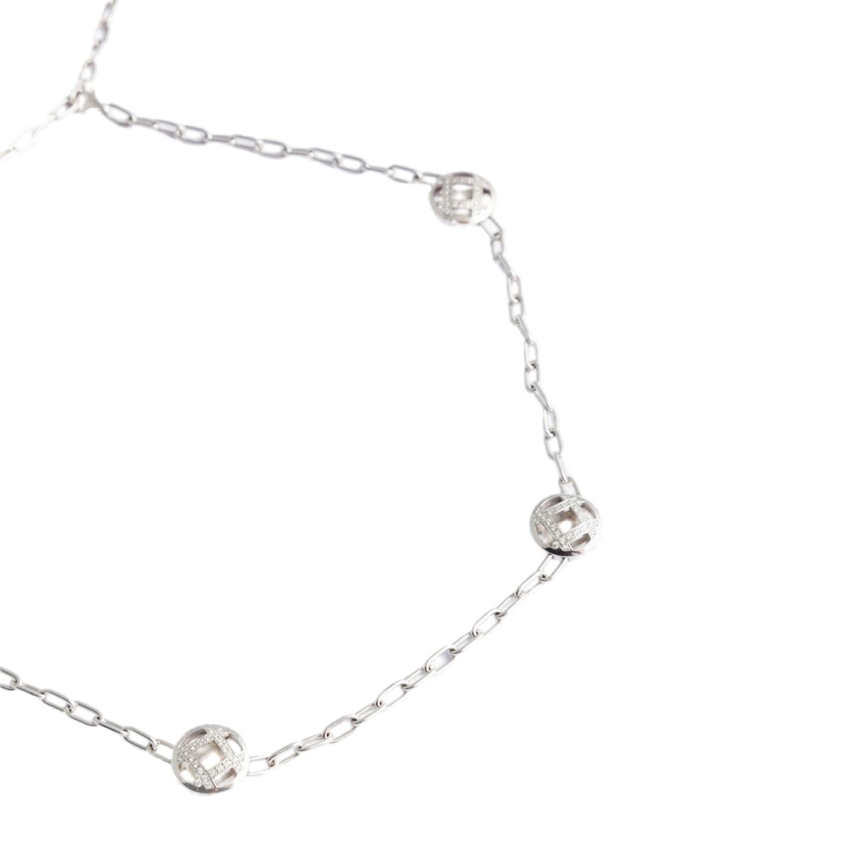 Collier CARTIER "Pasha" en or blanc avec motifs pavés de diamants - Castafiore