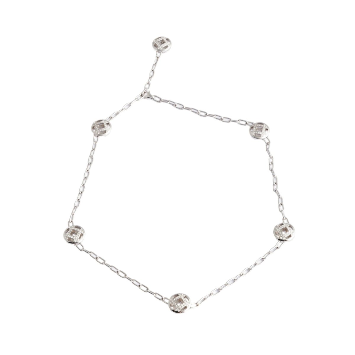 Collier CARTIER "Pasha" en or blanc avec motifs pavés de diamants - Castafiore