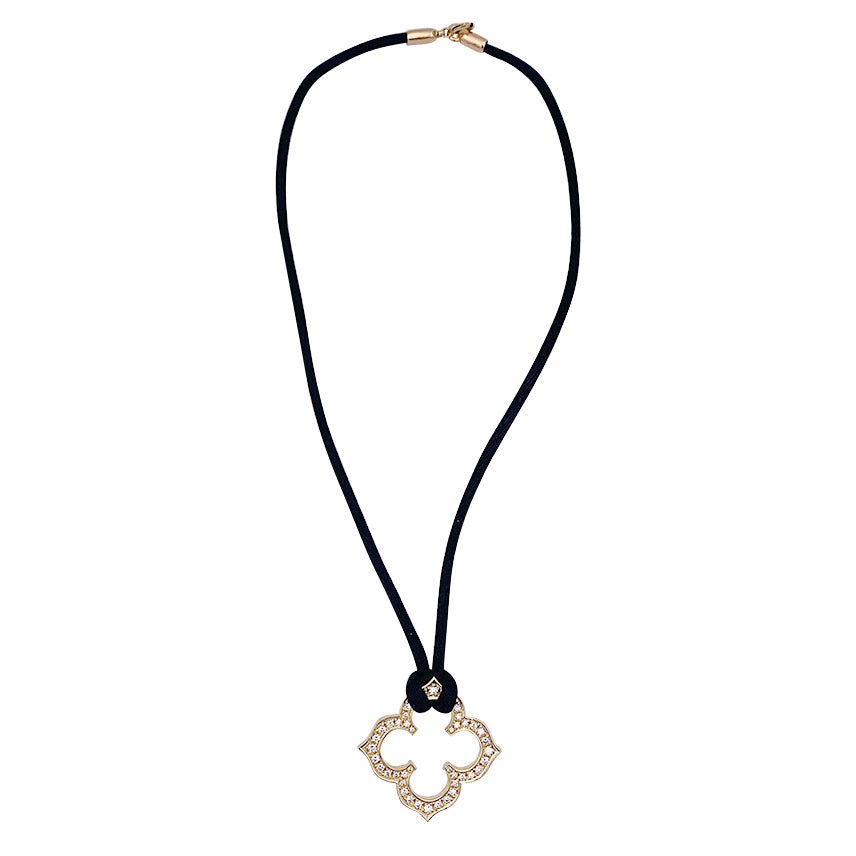 Collier CARTIER "Trèfle Gothique"en or jaune et diamants. - Castafiore