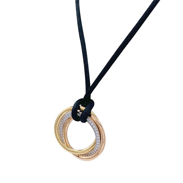 Collier Cartier, "Trinity", trois ors, diamants - Castafiore