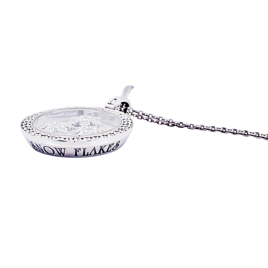 Collier Chopard, "Happy Snow Flakes", or blanc, diamants. - Castafiore