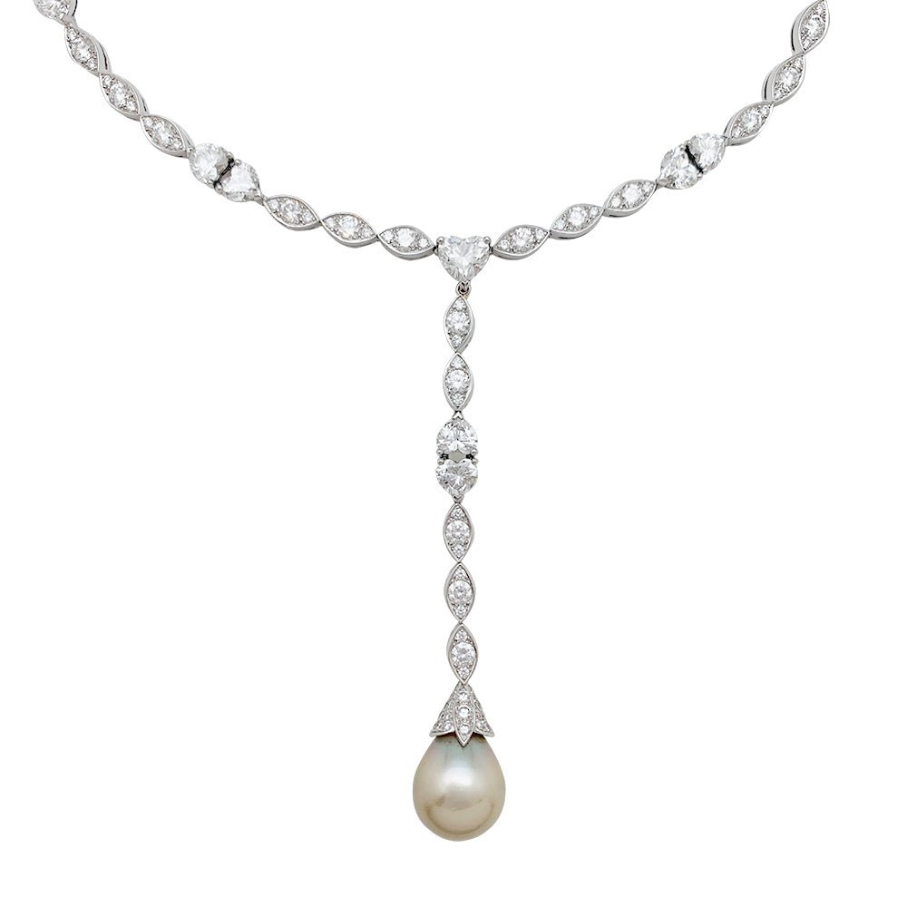 Collier cravate CARTIER, "Amour", or blanc, diamants, perle de Tahiti - Castafiore