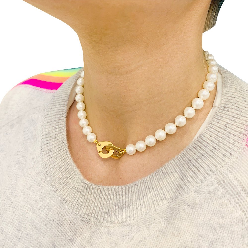 Dinh Van pearl necklace, “Menottes R15”, in yellow gold – Castafiore
