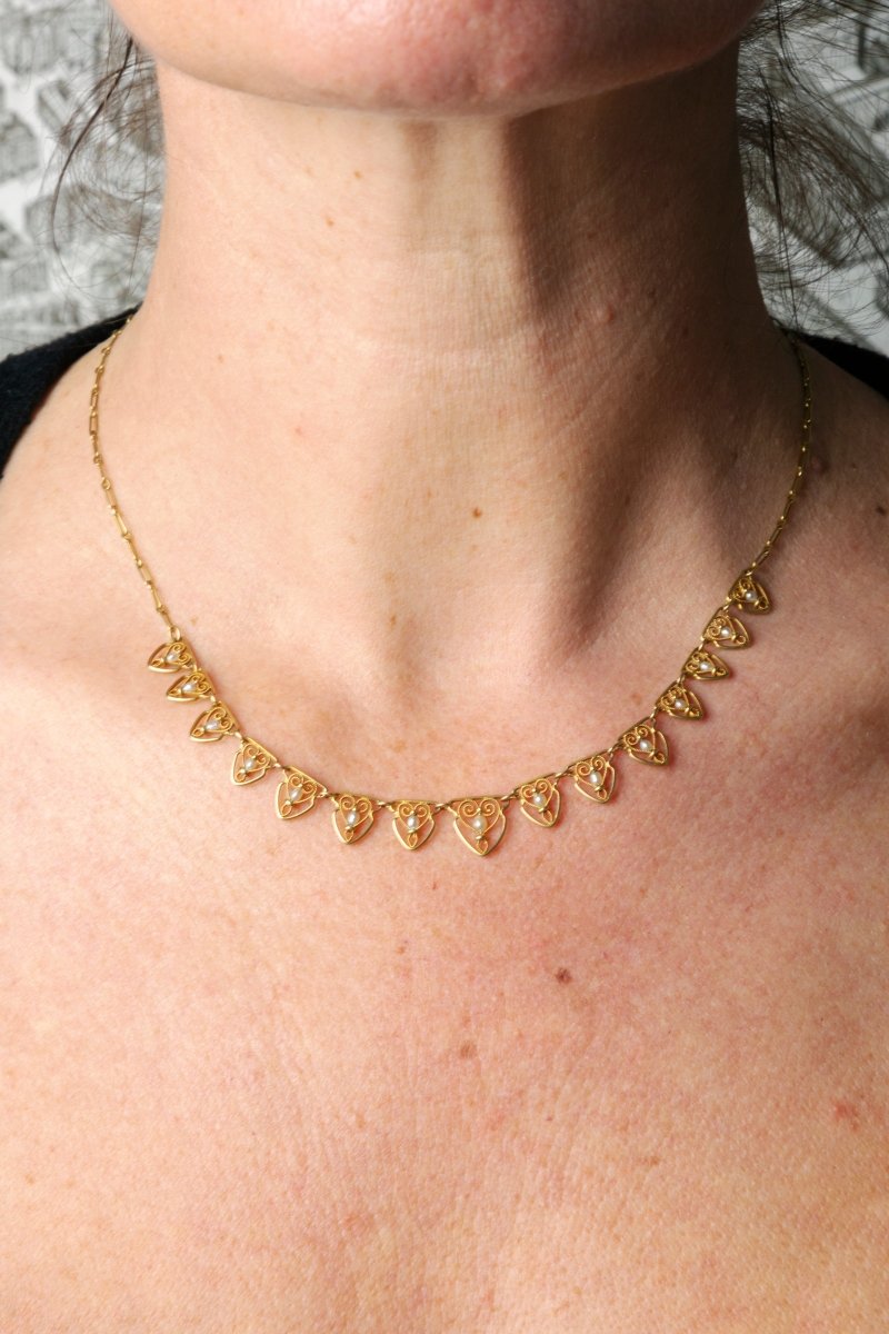 Collier en or jaune et et perles fines - Castafiore