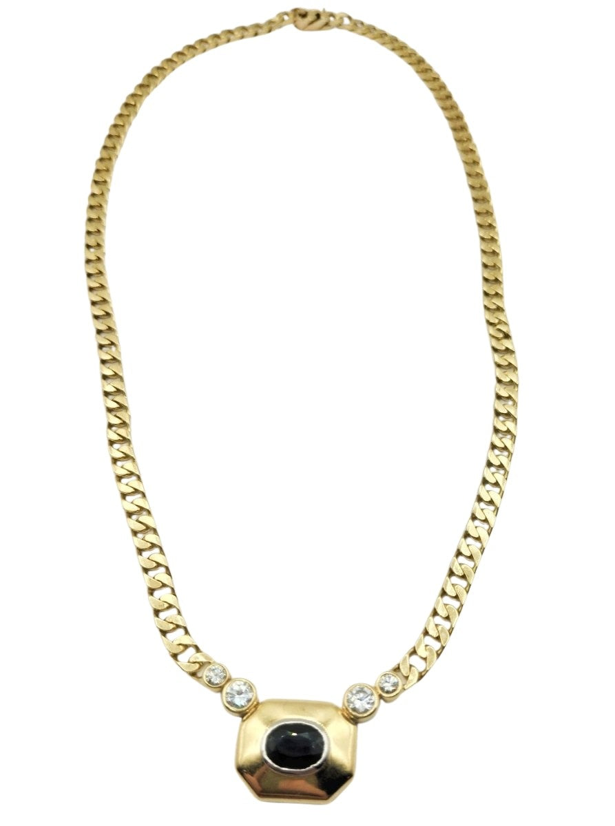Collier en or jaune, motif central avec un saphir cabochon et des diamants - Castafiore