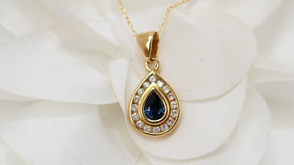 Collier en or jaune, saphir et diamants - Castafiore