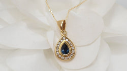 Collier en or jaune, saphir et diamants - Castafiore