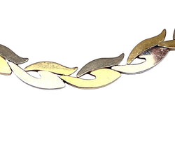 Collier et bracelet en or jaune et blanc 18 carats formant parure - Castafiore