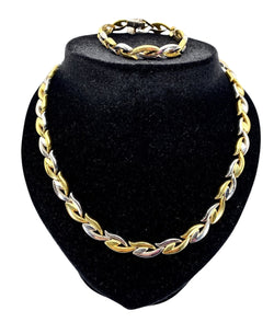 Collier et bracelet en or jaune et blanc 18 carats formant parure - Castafiore