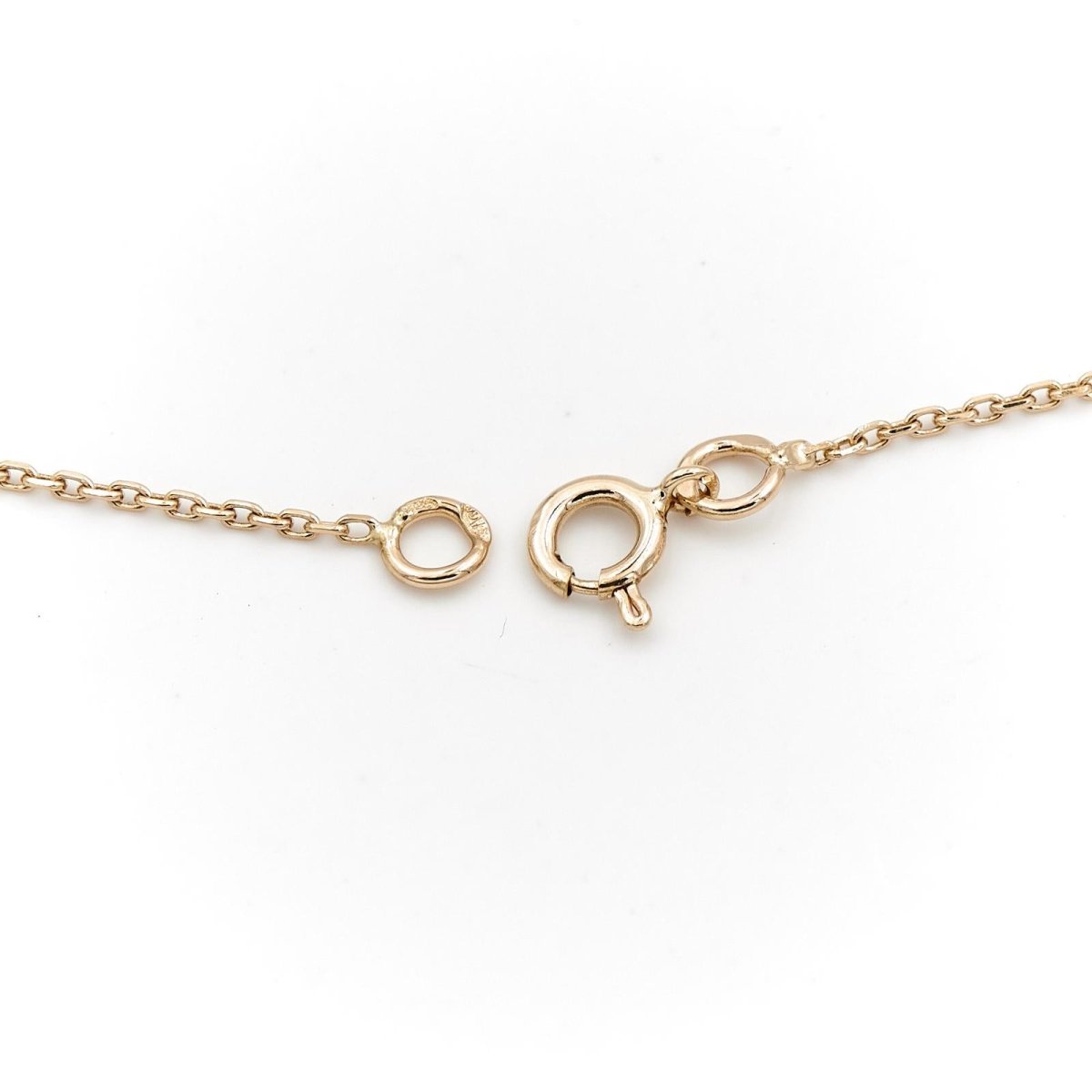 Collier fin en or jaune, diamants et saphir - Castafiore