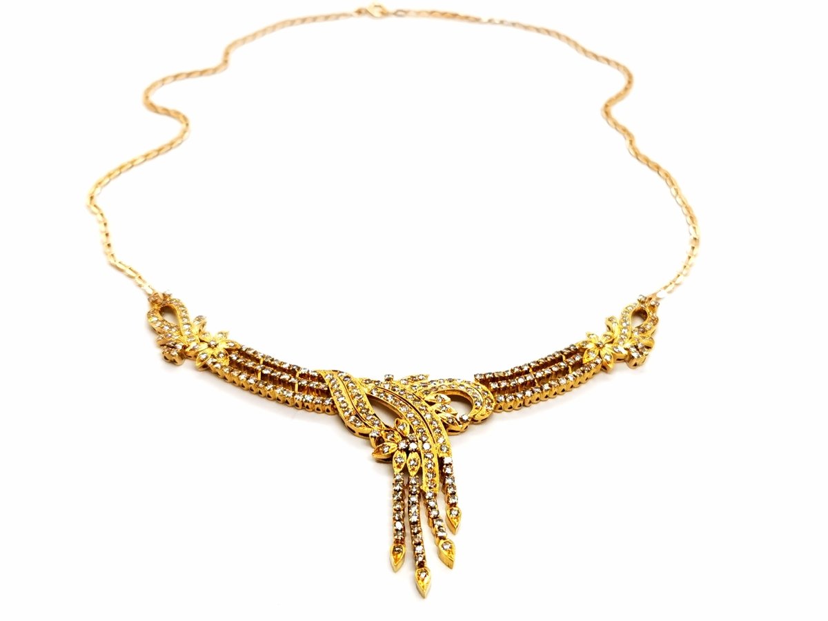 Collier fleurs en or jaune et diamants - Castafiore
