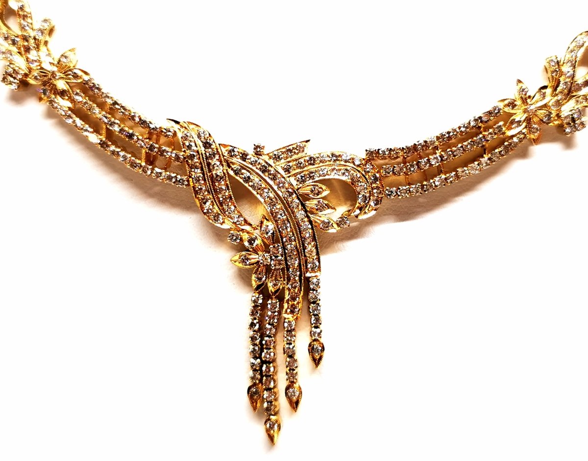 Collier fleurs en or jaune et diamants - Castafiore