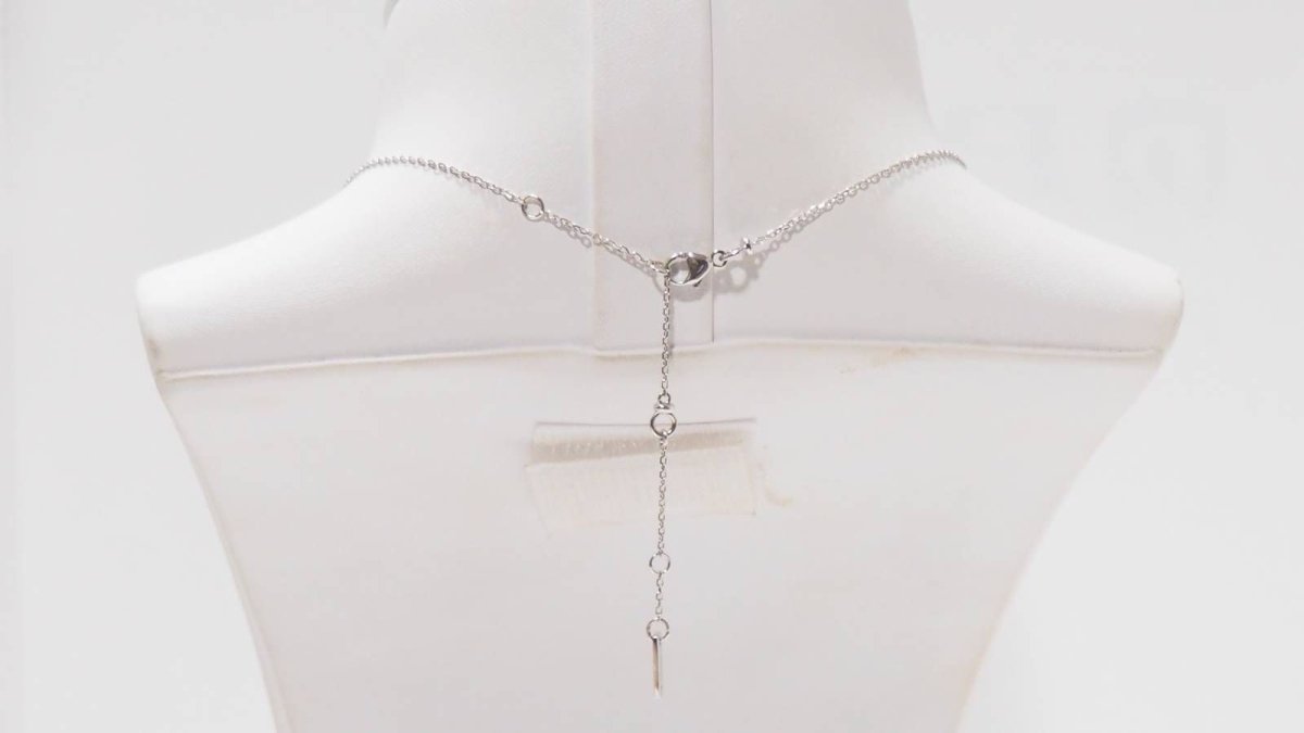Collier Messika "Snake" en or blanc et diamants - Castafiore