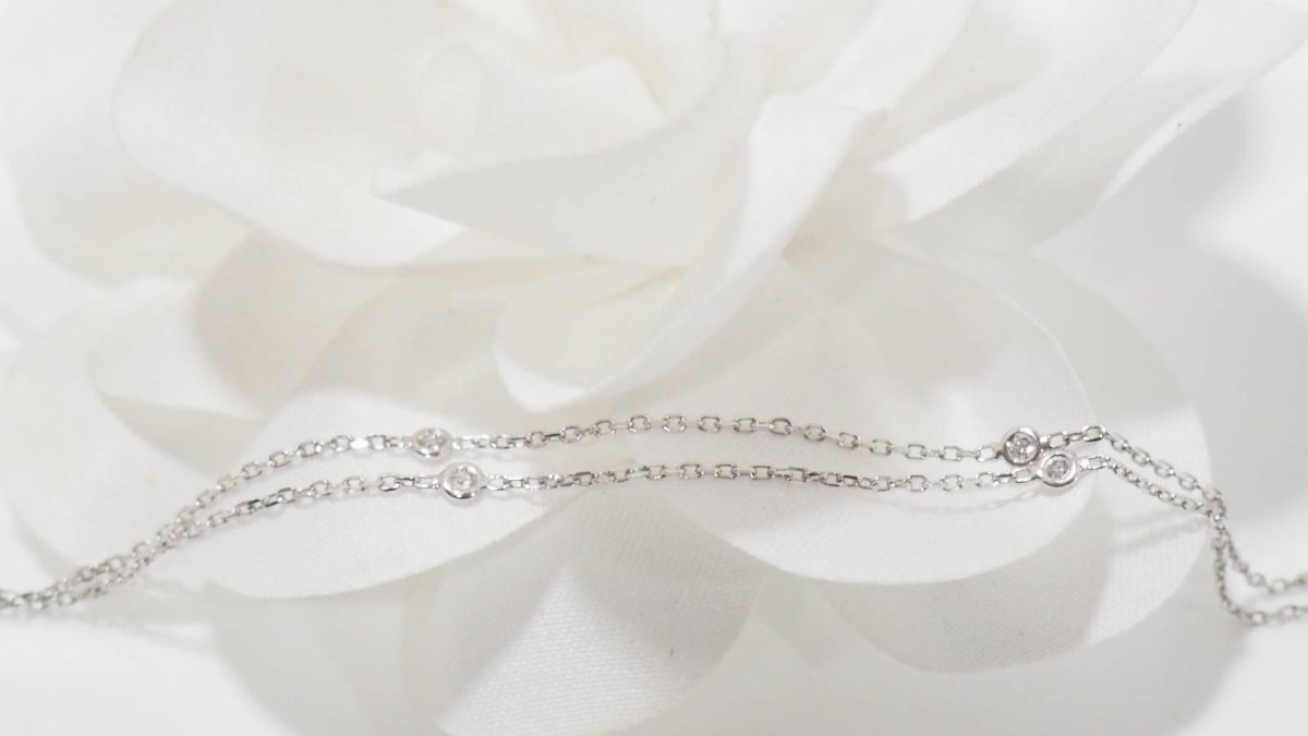 Collier Messika "Snake" en or blanc et diamants - Castafiore