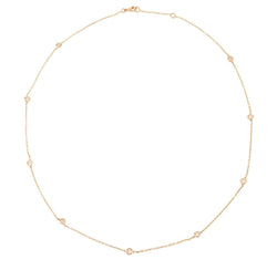 Collier or jaune intercalé de 9 diamants sur maille forçat en sertis clos. - Castafiore