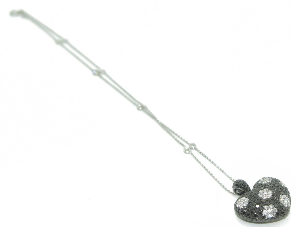Collier ornée d'un pendentif formant un cœur en diamant noirs et blancs - Castafiore