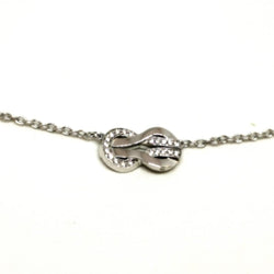 Collier Pendentif FRED Chance infinie, en or blanc et diamants - Castafiore