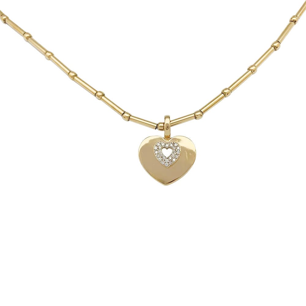 Collier Poiray "Coeur Secret" en or jaune, diamants - Castafiore