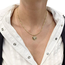 Collier Poiray "Coeur Secret" en or jaune, diamants - Castafiore