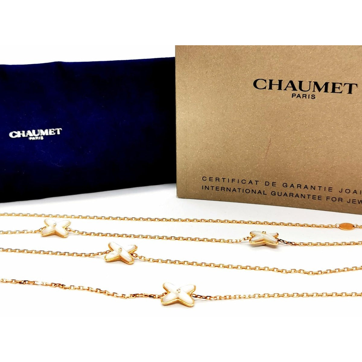 Collier Sautoir CHAUMET "Jeux de liens" en or rose, nacre et diamants - Castafiore